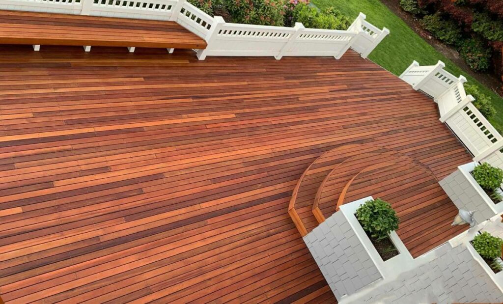 Gorgeous deck with Benjamin Moore stains looking out at back yard.