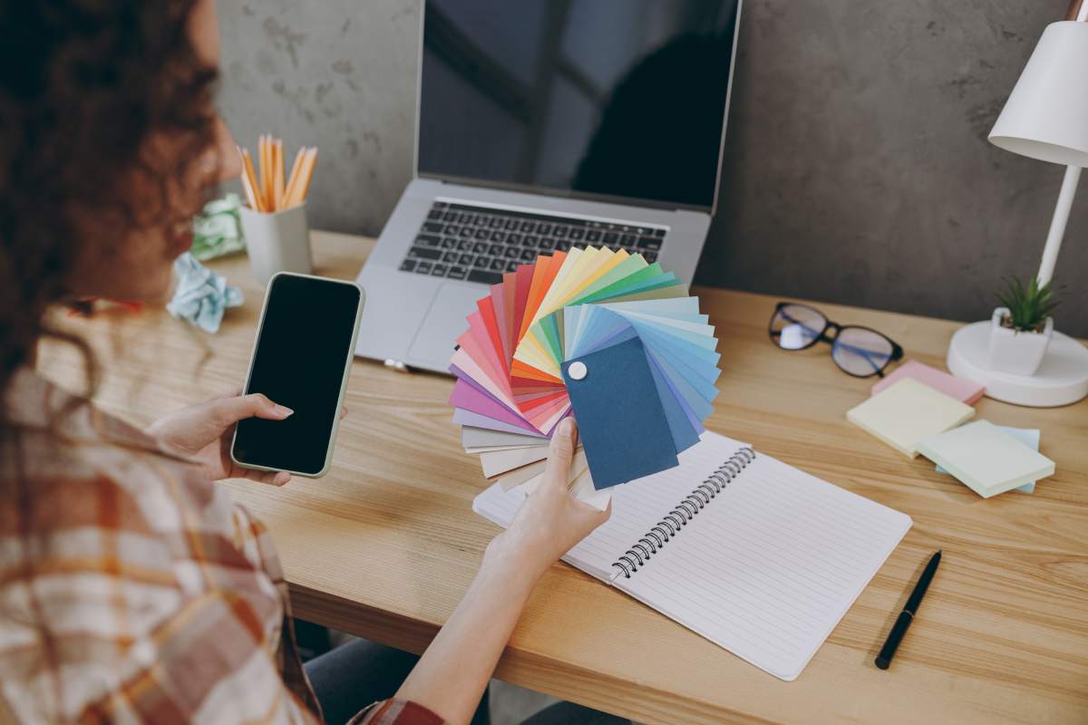 Image of a person painting an office space